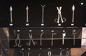 A display presents replicas of the earliest instruments for eye surgery.
