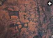 Near Bir Hima, in Saudi Arabia’s southern Najran region, a parade of piebald long-horned cattle, ibex, ostrich and camel-riders marches above the surrounding plains. The frieze shows a variety of styles, suggesting it was carved by several artisans at widely differing times.