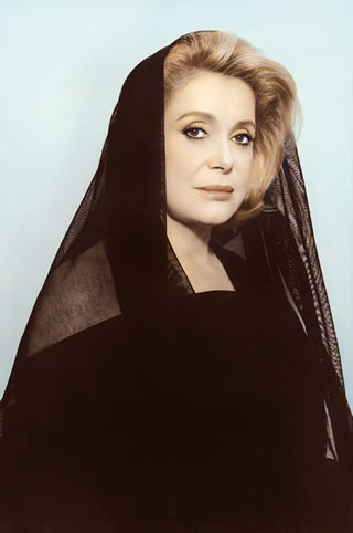 Youssef Nabil, “Catherine Deneuve, Paris,” 2010. Hand-colored gelatin silver print, courtesy of The Third Line Gallery and Nathalie Obadia Gallery.