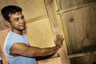 In what may be a contemporary echo of a practice that began 40,000 years ago, Syarifuddin, a resident in a village near the park, shows the faded ceremonial handprints that he placed four years ago on the timbers of his home to bring—as tradition has it—good fortune. 