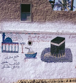 A painting from the walls of houses in the Egyptian town of Farafra celebrate the residents’ recent pilgrimages—by ship and by air, respectively.