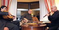 Simon Shaheen, Ali Jihad Racy and Jivan Gasparyan practice in Elder’s hotel suite.