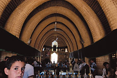 In Chubaish, the “Venice of Iraq,” a grand mudheif, or communal reception hall, has been built. It shows the strong, light, flexible arches of bundled reeds that are the most striking feature of the once common traditional architecture of the marsh tribes. 