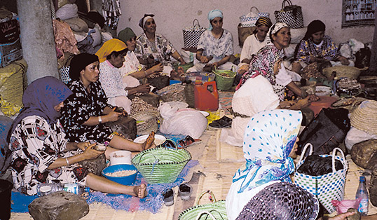 In the Cooperative Amal in Tamanar, women crack argan-nut shells with round stones. It takes 15 to 20 hours—depending on skill—to crack enough nuts to produce a liter of oil.