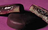 Chocolate-covered discs of marzipan topped with fruit preserves are a modern invention. 