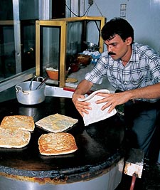 A popular griddle-fried dish—also in the category of dough-wrapped spiced-meat dishes—is mutabbaq, a "fast food" whose popularity has spread from the Hijaz to the entire kingdom. Its name comes from the word tabbaq, which means "to fold." 