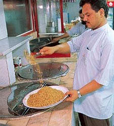 There are more than 15 popular styles of rice cookery in Saudi Arabia, and one of the favorites is ruzz bukhari (“Bukhara rice”), which is cooked with tomatoes, nuts and raisins in a style that came to the Hijaz with pilgrims from Central Asia. 