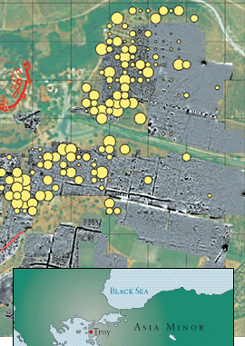 On one of the Troia Project’s maps of the excavations, the size of the yellow circles indicates relative concentrations of Bronze Age surface finds. The known defensive walls of the city are in red.