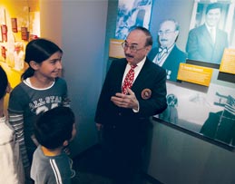 On the new museum's opening day, scientist, antarctic explorer and almost-atstronaut George Doumani captivates young visitors in front of the display honoring his accomplishments. "One of the greatest honors for me is to be recognized by my own people," he says.