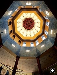 At the center of the museum is its three-story, tiled and gilded dome.