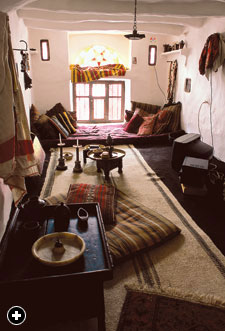 Interior of a traditional tower house diwan, or sitting room. 