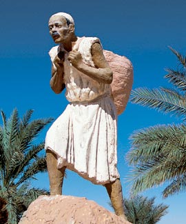 The statue of the rammaal, the sand porter, at the entrance to Daouia Farm symbolizes the hard labor that was required to grow crops in this desert beginning in the late 14th century.
