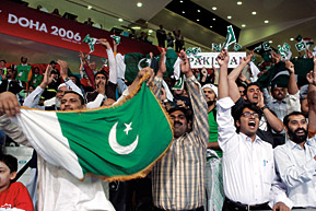 Pakistani supporters cheer their team. 