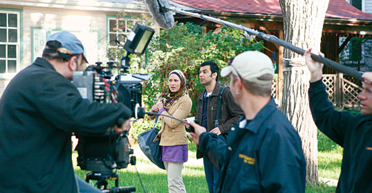 Hewitt and Shaikh work on the set. Filming this year’s 20-episode series took four months in Toronto and two months in Regina. 