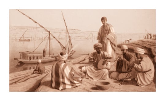 Lane twice ascended the Nile as far as the Second Cataract. This drawing of his boat (dahabiyeh) and its crew is typical of his illustrations: It attempts to convey as much information as possible, including details of the boat, the crew’s clothing, their musical instruments—and even shadufs, the water-raising device in the background, right. 