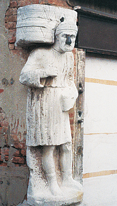 An iron-nosed statue of a trader is said to be a portrait of one of the Mastelli brothers.