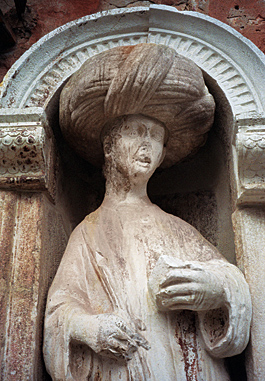 A 13th-century statue of a “Moorish” trader sports a later, comically oversized turban.