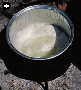 Ayran left over from butter-making being boiled up in preparation for making çökelek, a salty, dry yogurt cheese often used to fill börek.