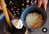 Yogurt butter being removed from the kovan