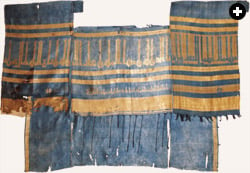 This fragment of a robe of honor dates to about the year 1000 in Baghdad. Sewn into it is a certificate of office: “For the use of Abu Said Zandanfarruk ibn Azamard, the Treasurer.”