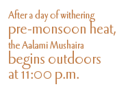 After a day of withering pre-monsoon heat, the Aalami Mushaira begins outdoors at 11:00 p.m.