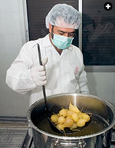 Whole pears are poached in sweet syrup. For centuries before refrigeration, sugar—like salt —was used as a preservative.