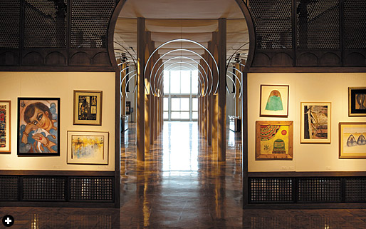 French exhibit designer Adrien Gardère used architectural motifs associated with the Arab world to frame exhibits including “Breaking the Veils: Women Artists From the Islamic World.”