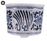 Three incense burners show, top, the deep cobalt blue that is typical of Ming ceramics; center, a stylized mark of the Zhengde emperor in the lighter blue of the Qing Dynasty and, lower, a 19th-century design using green enamel and highly stylized sini script.