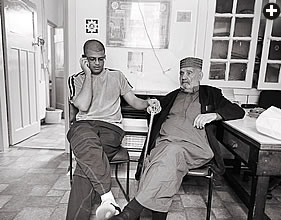 Adnan Sayyadi visits with his grandfather Mohammed Sayyadi in Mohammed’s boardinghouse, one of two remaining in South Shields.