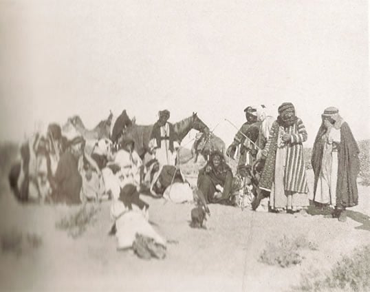 Musil traveled with a glass-plate camera, and he made this image of Ruwala Bedouin while the tribe rested in Wadi Sirhan, near the modern border of Jordan and Saudi Arabia. In the center is Prince Nuri ibn Hazza ibn Sha‘lan, who became one of Musil’s closest friends.