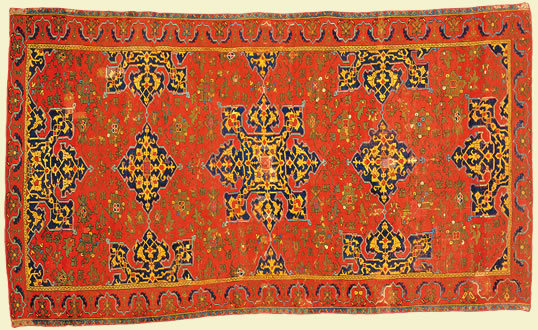 The one shown is similar to a star-Ushak carpet, above, from west-central Anatolia, dated to the late 16th century.