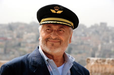 Nadim Sawalha endears himself to local children —and his audience—as the airport janitor who is mistaken for a pilot in “Captain Abu Raed.” 