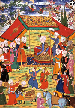 The Mongol ruler Timur (1336–1405) is shown receiving a delegation under his tent canopy in this painting from a Zafer Nameh (Book of Victory) from 1600. Courtiers behind Timur hold a horsetail banner and a quiver of arrows; dancers and servants are in the foreground.