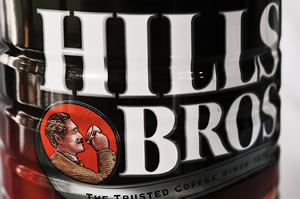 In 1990, Hills Bros adopted a new “taster” figure designed to evoke its turn-of-the-century American founders.