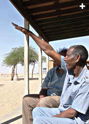 Eyewitness to the explosion of 2008 TC3, station attendant Abdel Moneim Magzoub points out the altitude of the fireball to Muawia Shaddad of the University of Khartoum. 