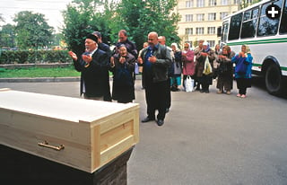 Outside the mosque, Mufti Ponchaev leads prayers for a funeral. Between World War ii and 1956, Muslims were frequently buried near a former Polish cathedral.