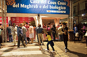 Food stalls line the streets during the weeklong Cous Cous Fest. This one offers couscous from North Africa as well as organic couscous. 