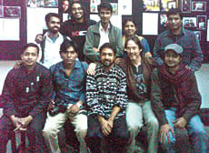 "Portraits of Commitment" was led by Dick Doughty, managing editor of Saudi Aramco World, and D. M. Shibly, an instructor at Pathshala South Asian Media Academy and a staff photographer at ICE Today magazine. Bottom row, from left: Students M. N. I. Chowdhury and M. R. K. Palash, Pathshala Vice Principal Abir Abdullah, Dick Doughty and D. M. Shibly. Top row: Students K. M. Asad, Ashraful Awal Mishuk, Syed Ashraful Alom, Taslima Akhter and Hasan Raza. Not shown: Students N. Haider Chowhury and A. M. Ahad. Special thanks to Pathshala Principal Shahidul Alam, workshop coordinator Snigdha Zaman and tutor Munem Wasif for the support and encouragement that made this article possible.