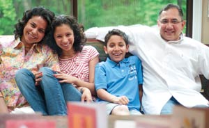 "I couldn't do it without my family," says Saanya, shown here with her mother, Salma, brother, Zayd and father, Arif, who adds that "sharing is a constant topic of discussion at the dinner table."