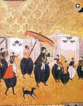 Left: Arriving in Japan in the 17th century, the Portuguese ambassador was depicted under an elaborate umbrella. Right: Japan was one of the few places where umbrellas became objects of fashion from an early time, and today the bamboo parasol remains a national folkloric symbol.