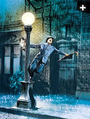 The unreliability of Europe's early steel umbrellas caught the eye of French satirist Daumier, left, but by the time Gene Kelly turned his bumbershoot into an iconic Hollywood dance prop in "Singin‘ in the Rain," right, the waterproof umbrella had become plain and practical, offering little hint of its and powerful past.