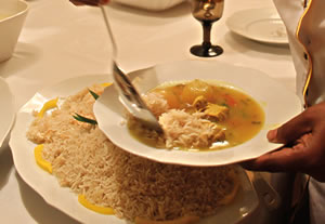 Served with a scoop of white rice, traditional paplou is a bright, flavorful soup made with fish stock, lemon juice, cilantro, fennel, turmeric and garlic together with soft, sautéed chunks of onion and fresh-caught tuna.