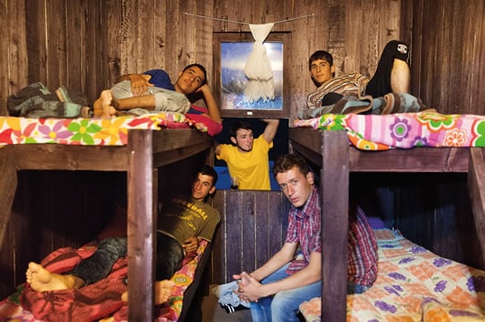 Teenagers and students working the harvest often stay in dormitory housing such as these rooms on the Akbash farm. In a women’s dormitory, clockwise from upper left, are Fatma, Semia, Neslihan and Suna; in a men’s dormitory, below, are Ibrahim, Ahmet, Hayati, Bunyamin and Cengiz.