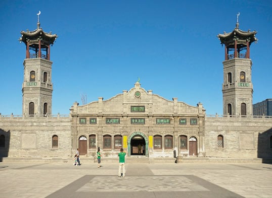 The two three-story towers flanking the portal to the recently restored 18th-century mosque at Datong in northern Shanxi province are local interpretations of a recently universalized, non-Chinese symbol of Islam.  The crescent finials at the top of the towers are complemented by Chinese bells hanging from the eaves.