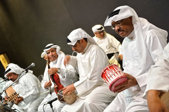 Melding sounds from ‘ud, violin and drums, members of the Ensemble Muhammad bin Faris help keep alive the sawt  tradition of the eastern Arabian Peninsula, together with musicians playing the qanun (Arab zither), ney (woodwind flute) and electric keyboard, all of which support the Ensemble’s vocalists.
