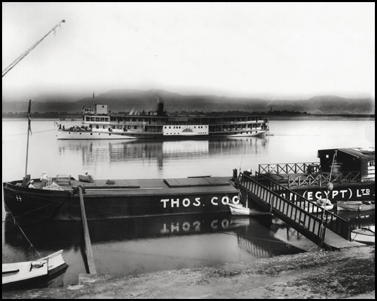Gaddis & Co.’s storefront faced the Nile, and this made it easy for Gaddis to capture the river’s activity. This image, from the 1920s, shows the Thomas Cook launch and steamer, Sudan.