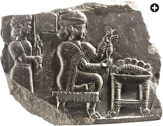 Domestic tableaux are rare for the eighth and seventh centuries bce: Most images of the time were devoted to gods, rulers and warfare. This Elamite bas-relief, carved in a bitumen compound, shows a woman seated on a chair, her feet daintily folded beneath her, proudly holding up a threaded spindle; a servant with a fly-wisk stands behind her. Its realism and simple humanity impart a glimpse into a private domain in the distant past.