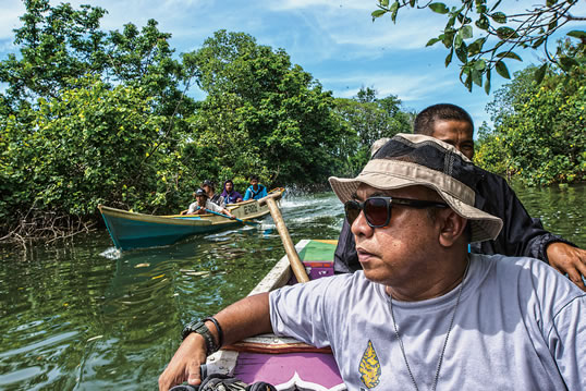 Passing villages and often chatting with residents along the way, archeologists Ramli, Pampang and their team boat out after four days in the caves. Local relations, says Pampang, are key to successful conservation. “We ensure they understand it’s their own proud heritage,” he says.