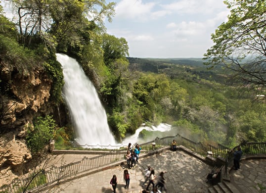 A balcony allows modern tourists to enjoy a waterfall in Edessa, Greece. 