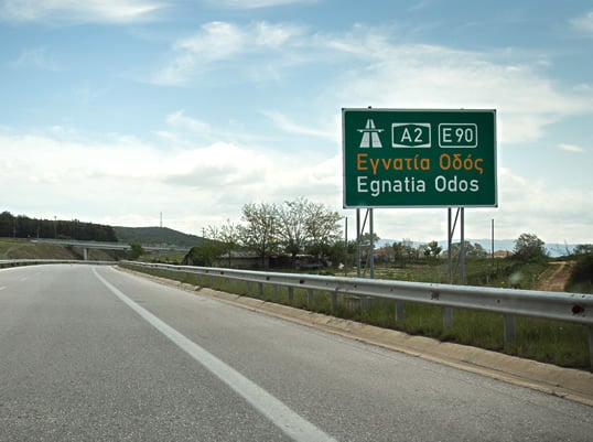 A modern sign along the expressway, above, that now traces some 300 kilometers of the old road's path in northern Greece and southern Turkey.